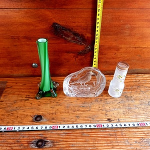 Vintage glass vases for small flowers and a glass bird. Antique souvenir. Vases for flowers. Glass vases.