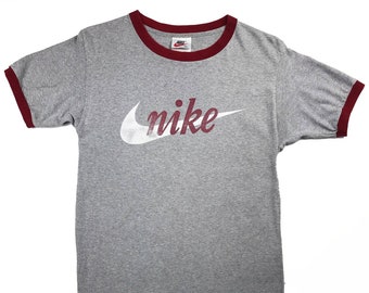 camiseta nike cajas