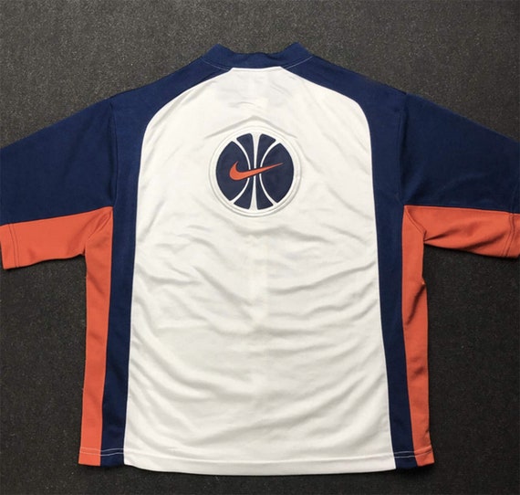 royal blue and orange nike shirt