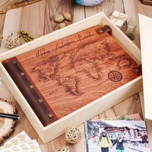 Wedding photo album with world map and compass, travel scrapbook album