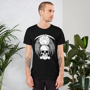 May include: Black t-shirt with a white graphic design of a skull with wings, a globe, and a scythe. The graphic is centered on the shirt.