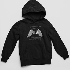May include: Black hooded sweatshirt with a white graphic print of an eye with wings. The text reads "You going to realize no one will be here for you."