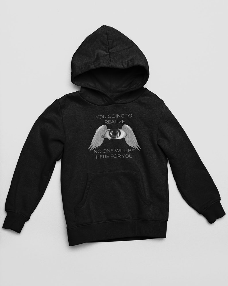 May include: Black hooded sweatshirt with a white graphic print of an eye with wings. The text reads "You going to realize no one will be here for you."
