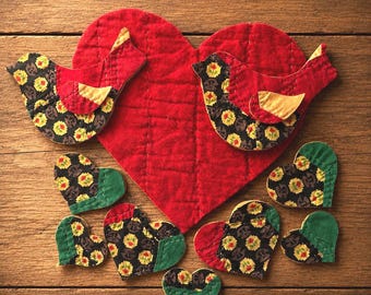 1960年代のモダンなパッチワーク、手縫いのキルティングと刺繍が施され
