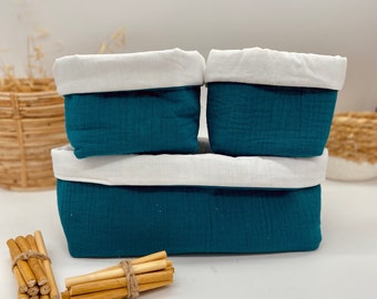 Baby storage baskets in plain peacock blue double cotton gauze