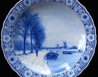 Royal Delft blue (1971) handpainted plate with Dutch winter landscape (Porceleyne Fles, after Apol)