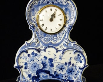 Royal Delft blue (1968) handpainted manual clock w. floral decor (Porceleyne Fles)