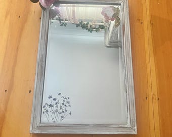 Stunning antique beveled mirror with hand applied florals  original glass