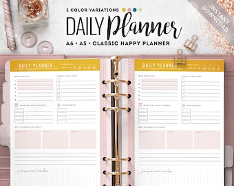 May include: A pink and yellow daily planner with a gold binder. The planner has sections for main priorities, things to get done, important dates and events, appointments, and meal planning for the day. It also has a section for personal notes.