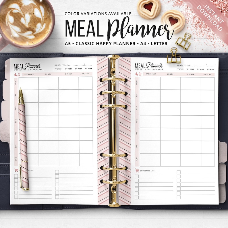 May include: A pink and white meal planner with gold accents. The planner is open, displaying weekly meal planning pages with space for breakfast, lunch, dinner, and snacks. The text "MEAL Planner" is visible, along with "A5 &bull; CLASSIC HAPPY PLANNER &bull; A4 &bull; LETTER".