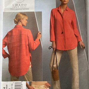 May include: A sewing pattern for a long-sleeved shirt with a button-down front and a curved hem. The pattern is for sizes 8-10-12-14 and is by Chado Ralph Rucci, a Vogue American Designer.