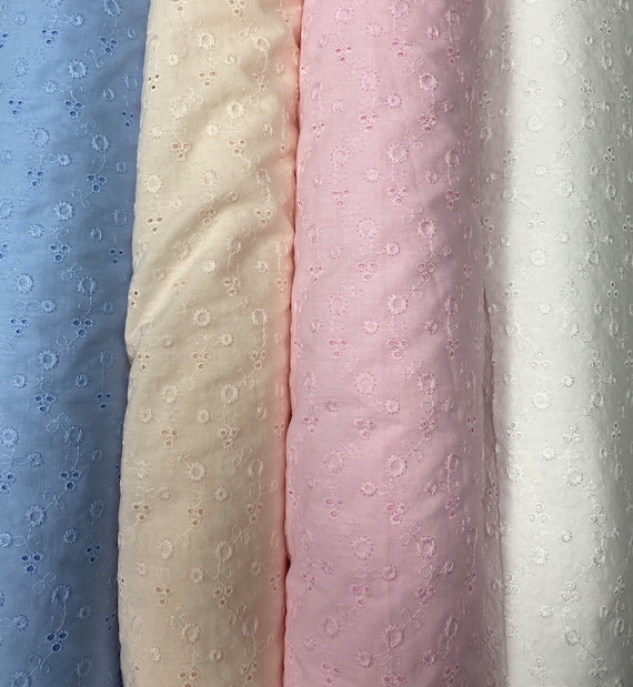 Cotton broderie anglais fabric in 4 colour choices. 60” width by the half metre