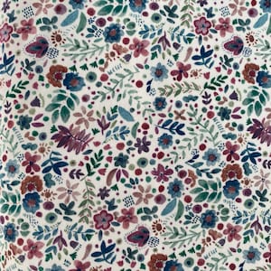 May include: A white fabric with a repeating pattern of small, colorful flowers and leaves. The flowers are in shades of pink, red, blue, and green.