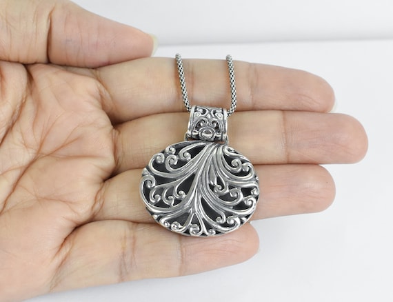 Silver medallion necklace deals