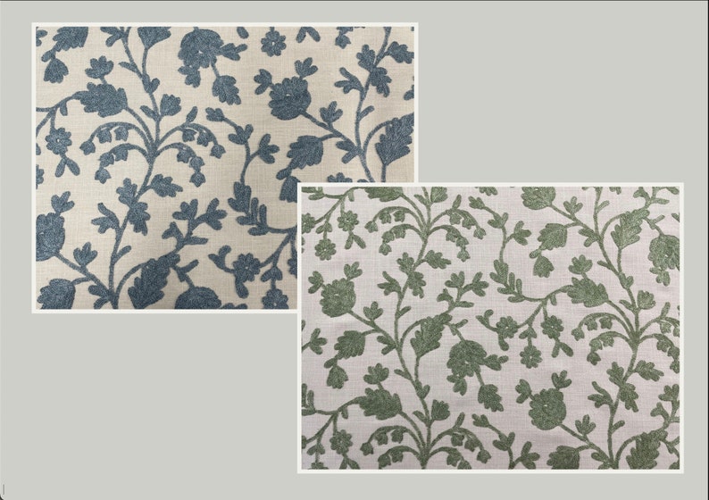 May include: Two fabric swatches with a white background and a floral pattern. The top swatch has a blue floral pattern and the bottom swatch has a green floral pattern.