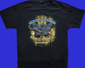 Distressed by hand done process to upcycle this one of a kind original. Womens size 1X Harley Davidson shirt