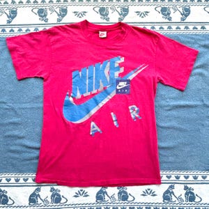 Vintage 1980s Nike Air T-Shirt - Vibrant Pink with Blue Logo, Single Stitch