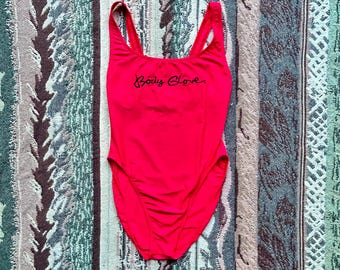 Vintage 1990s Body Glove Neon Pink One Piece Swimsuit Embroidered Logo Size 7/8