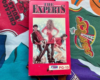 VHS vintage de Los expertos de 1989 - John Travolta, Kelly Preston