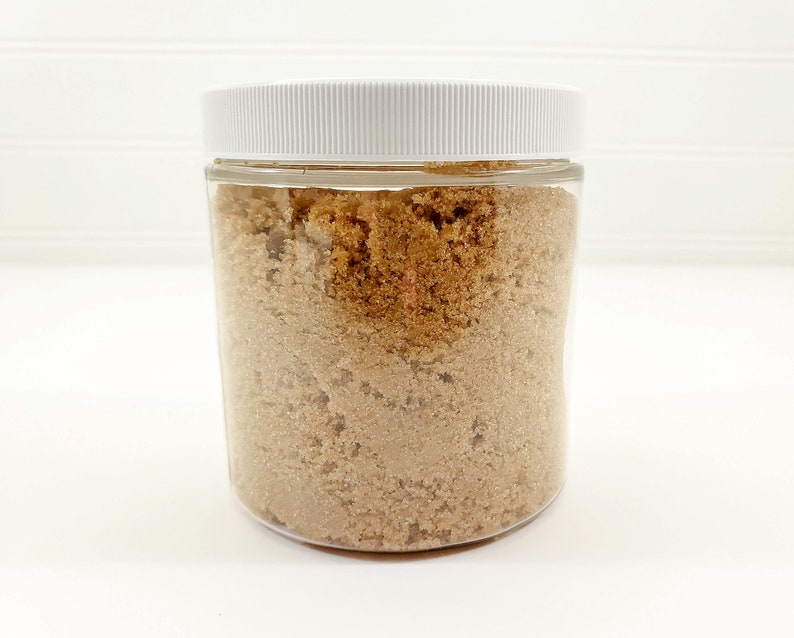 May include: A clear glass jar with a white lid filled with brown sugar.