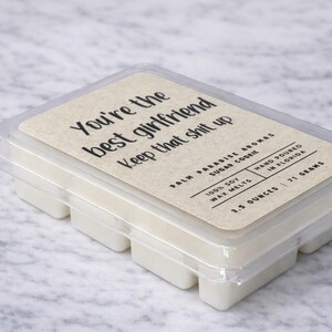 A package of white candles with a label that reads "You're the best girlfriend Keep that shit up".