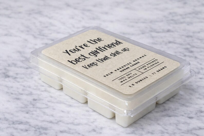A package of white candles with a label that reads "You're the best girlfriend Keep that shit up".