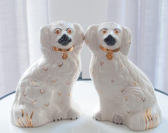Pair of Staffordshire dogs flat back mantle spaniel by Royal Doulton/ Beswick