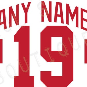 May include: Red and white sports jersey design with the number 19 on the front and back. The text "ANY NAME" is above the number. A red winged logo is in the bottom left corner.