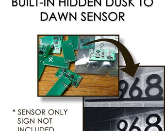 Optional built-in hidden dusk-till-dawn daylight sensing feature for Delle Maison backlit house numbers sign