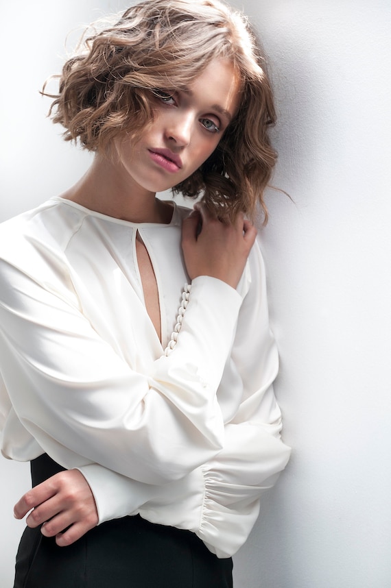 Blusa satinada manga larga new arrivals