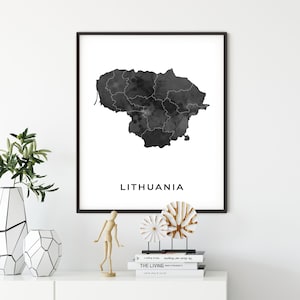 May include: Black and white watercolor print of the map of Lithuania with the word "Lithuania" printed below the map.