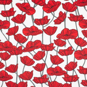 May include: White fabric with a repeating pattern of red poppy flowers with black outlines. The flowers are stylized and have a simple design.
