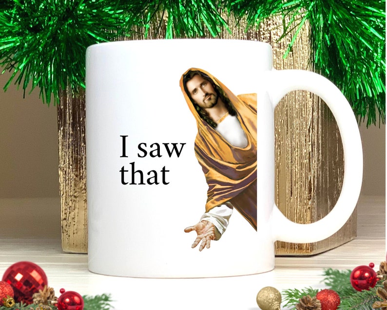 K&ouml;nnte beinhalten: Wei&szlig;e Keramik-Kaffeetasse mit einer Grafik von Jesus, der "Ich habe das gesehen" sagt.