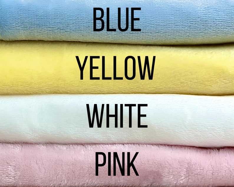 May include: Four fabric swatches stacked on top of each other. The top swatch is blue, the second is yellow, the third is white, and the bottom swatch is pink.