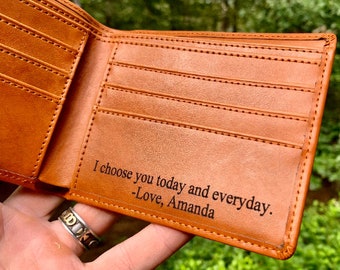May include: A brown leather wallet with a personalized inscription that reads "I choose you today and everyday. -Love, Amanda".