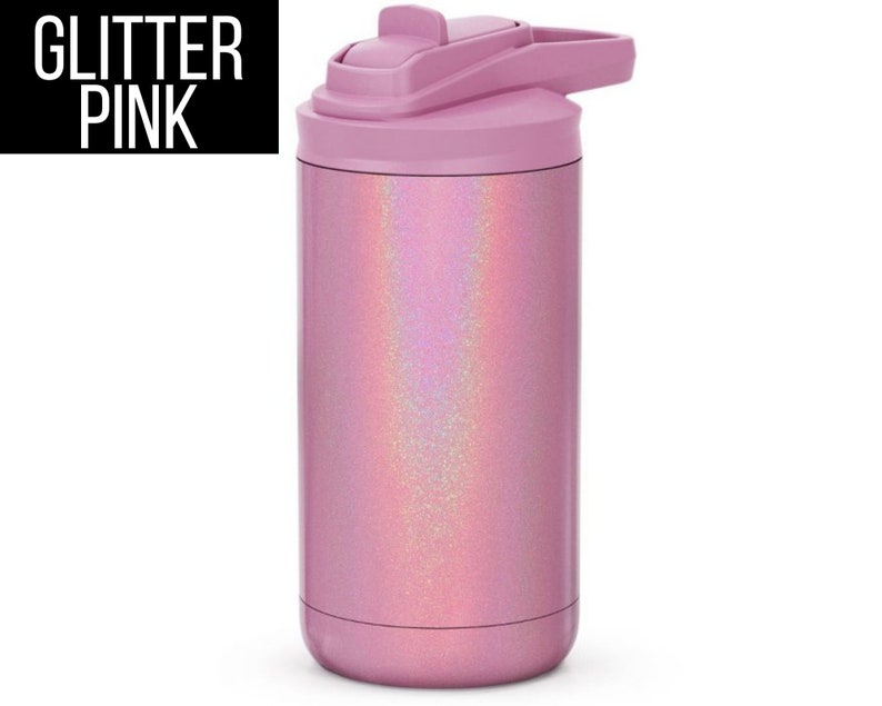 May include: A pink insulated water bottle with a glitter finish. The bottle has a flip-top lid and a handle. The text "GLITTER PINK" is in a black rectangle in the upper left corner. The bottle is designed to keep drinks cold.