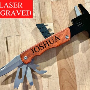 May include: A multi-tool hammer with a wooden handle and a black metal head. The handle is engraved with the name "JOSHUA". The tool has a knife, screwdriver, and other tools.