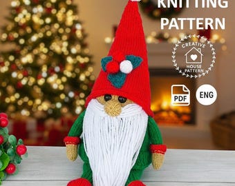 May include: A knitted Christmas gnome with a red hat, white beard, and green body. The hat is adorned with a white pom-pom and holly accents. The image includes the text "KNITTING PATTERN" and a PDF icon.