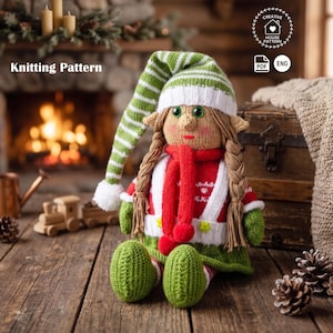 May include: A knitted elf doll with a green and white striped hat, long braids, and a red scarf. The doll wears a red and white sweater and green shoes. The words "Knitting Pattern" are in the upper left corner.
