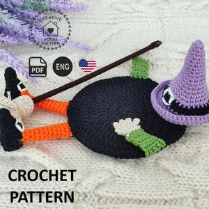 May include: A crochet pattern for a Halloween witch doll. The doll has a black body, orange legs, green accents, and a purple witch hat. The text "CROCHET PATTERN" is displayed.