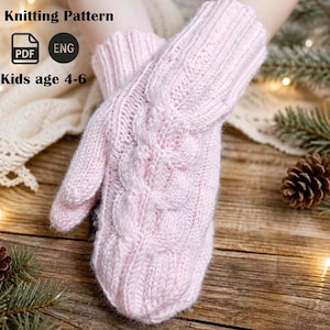 May include: A pair of light pink knitted mittens with a cable knit design. The mittens are labeled "Knitting Pattern" and "Kids age 4-6". The image also includes a PDF and ENG icon.