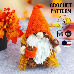 May include: A crocheted gnome with an orange hat, white beard, and brown pipe. The gnome wears a yellow scarf and holds a small orange pot. The image includes the text "CROCHET PATTERN".