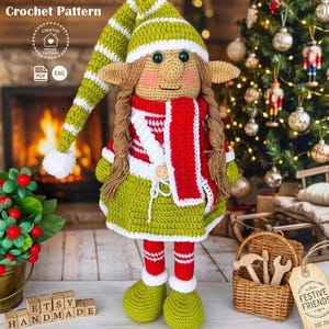 May include: A handmade crochet elf doll with a green and white striped hat, green dress, and red and white scarf. The doll has long brown braids and is wearing green shoes and red and white striped socks. The words "Crochet Pattern" are at the top of the image.