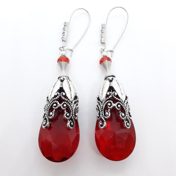 Boucles d'oreilles métal coloris argenté grosse perle facette rouge