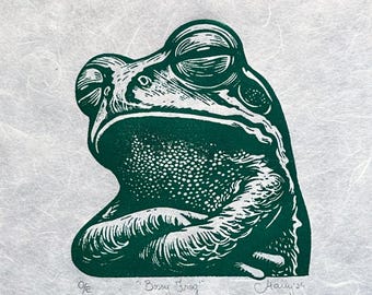 Frog with their Arms Crossed - Original Handmade Linocut Print. Title: “Bossy Frog”