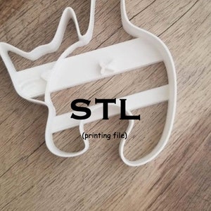 Puede incluir: Archivo STL de plástico blanco para impresión 3D. El archivo tiene la forma de un gato.