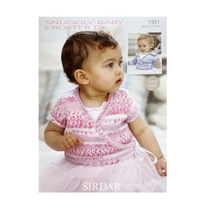 May include: A pink and white knit baby wrap with a tie closure. The wrap is shown on a baby wearing a pink tutu. The pattern is called "Snuggly Baby Crofter DK" and the number is 1931. The text "Easy Knit" is also included in the image.