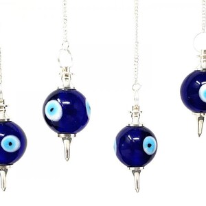 May include: Four blue glass pendulums with silver chains and tips. Each pendulum features a white evil eye design.
