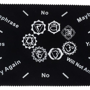Puede incluir: Tablero de péndulo de fieltro negro con texto y símbolos blancos. El texto dice "Rephrase", "Yes", "Try Again", "No", "No", "Maybe", "Yes", "Will Not Answer".