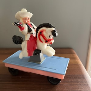 HTF Plastic Cowboy pull toy